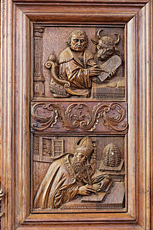 In the top panel Luke the Evangelist writes on a tablet. His attribute the ox looks on. In the lower panel we see Saint Ambrose with a bee-hive. Saint Ambrose is the patron saint of bees and beekeepers