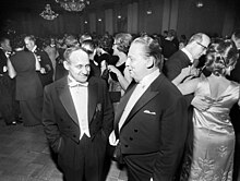 A Finnish author Vaino Linna (left) and his translator Nils-Borje Stormbom (right) in the middle of a ball at the 1968 Independence Day reception at the Presidential Palace in Helsinki, Finland Linna-Stormbom-1968.jpg