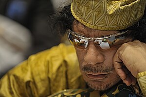 English: Muammar Qaddafi, the Libyan chief of ...