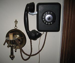 Rotary dial wall telephone. c. 1930s. Also see...