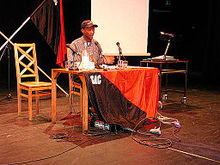 A ZACF activist speaking at an SAC-organised labour seminar in Sweden in 2005. South African Activist (39036979).jpg