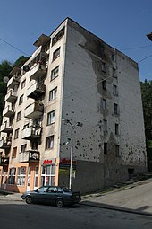 Damaged building in Srebrenica after the war Srebrenica 2008 1.jpg