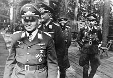 A photo of paratroop commander Kurt Studentfollowed by Hermann-Bernhard Ramcke and Hans Kroh in 1941