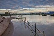 Children playing at sunset on a Mekong bank, Don Loppadi