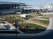 Terminal 3 of Indira Gandhi International Airport Delhi Terminal 3 Side View.jpg