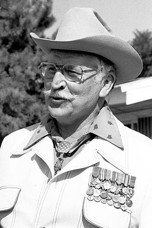 Retired Col. Lewis L. Millett wears his Medal ...