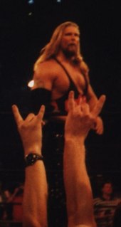 Nash, Scott Hall and Sean Waltman called themselves "The Wolfpac" and made hand gestures the crowd is seen giving Nash here. Kevin Nash Nitro '98 - Wolfpac Hands.jpg