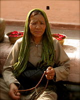 Tibetan woman praying