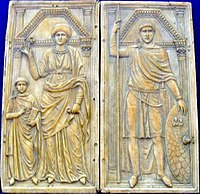 An unpainted carved ivory diptych which is believed to show Eucherius (left bottom) with his father Stilicho (right) and mother Serena (middle).