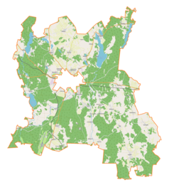 Mapa konturowa gminy wiejskiej Szczytno, na dole nieco na lewo znajduje się punkt z opisem „Szymany”