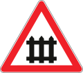Railroad crossing with barrier