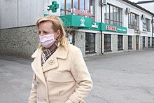 Wearing a face mask in public places was made obligatory in Ukraine on 6 April 2020 Women wearing mask during the COVID-19 pandemic in Khmelnytskyi, April 2020.jpg