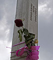 Floral tribute on a pillar