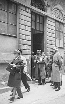 "Razzia" (raid) after the annexation of Austria at the headquarters of the Israelitische Kultusgemeinde in Vienna, March 1938 Bundesarchiv Bild 152-64-40, Wien, SS-Razzia bei judischer Gemeinde.jpg