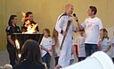 ☎∈ Iwan Thomas being interviewed after lighting the Olympic cauldron in Cambridge during the 2012 Summer Olympics torch relay.