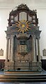 The altar topped by the pulpit and organ