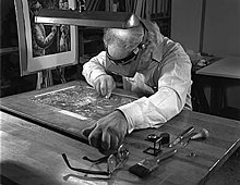 Artist and engraver Chaim Goldberg at work Engraving.jpg