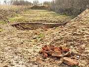 Suchschnitt nahe dem Grabhügel mit dem Fund von rotverziegelten Fragmenten eines prähistorischen Ofens, 2021