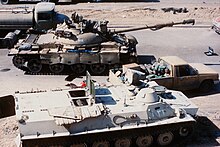 Abandoned Iraqi T-62 and military vehicles on the Highway of Death MT-LB, Mitsubishi pickup truck, T-62 tank and a Mercedes-Benz tank truck on the Highway of Death.JPEG