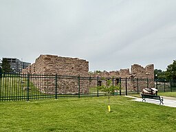 The Queen Bee Mill foundation is all that remains of the mill. Completed in 1881, the Mill included a seven-story building.