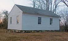 The same building from its side and rear, with just two windows in both facades and no other decorative elements