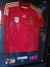 A Spain shirt from 2014, autographed by members of the 2010 World Cup-winning squad, on display in Madrid 2010 World Cup Autographed by the entire Spanish National Team that won the 2010 World Cup.JPG