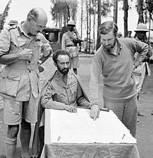 Haile Selassie with Orde Wingate (right) Haile Selassie, Emperor of Abyssinia, with Brigadier Daniel Arthur Sandford (left) and Colonel Wingate (right) in Dambacha Fort, after it had been captured, 15 April 1941. E2462.jpg