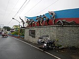 The Battle of Imus monument at the southern end of the bridge.