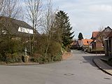 Schöppingen, view to a street: die Bergstrasse with sculpture