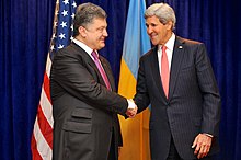 Secretary Kerry Shakes Hands With Ukrainian President-elect Poroshenko Before Meeting in Warsaw 01.jpg