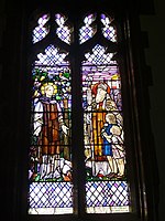 Window in St Leonard, Wollaton, Nottinghamshire.In memory of Henry Charles Russell (1842-1922), Rector of Wollaton 1876-1922.