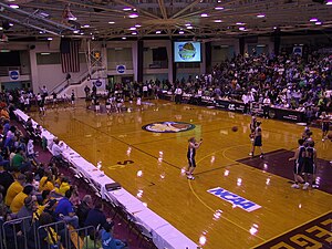 English: woman basketball game