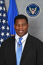 Walker's official portrait as a co-chair of the President's Council on Sports, Fitness and Nutrition Herschel Walker official photo.jpg
