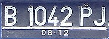 Design of Indonesian registration plate for private vehicles from 2000s to April 2011. Indonesian registration plate for Jakarta, Depok, Tangerang and Bekasi.jpg