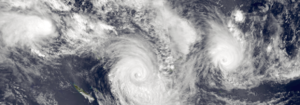 Satellite image of simultaneous cyclones in the South Pacific Ocean