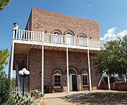 The Opera House was built in the early 1870s in Prescott by James Howey. In 1876, the Goldwater family established their first store there. Howey sold the building to Levi Bashford who in 1882, added a stage and converted the place into an opera house. The building ceased as an opera house in 1899.