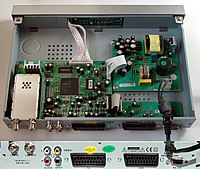 A consumer Palcom DSL-350 satellite-receiver; the IF demodulation tuner is on the bottom left, and a Fujitsu MPEG decoder CPU is in the center of the board. The power supply is on the right. Sat-Receiver Palcom DSL-350.jpg