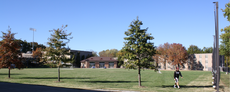 Student Activities Hall, field, Corcoran Residence