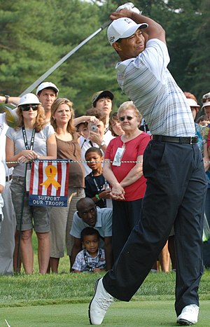 Tiger Woods, champion golfer, drives the ball ...