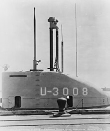 USS U-3008 (former German submarine U-3008) with her snorkel masts raised at Portsmouth Naval Shipyard, Kittery, Maine U-3008 Turm.jpg