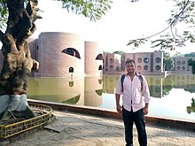 I am on front of the Bangladesh National Parliament Building