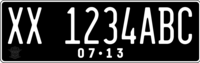 Former (until June 2022) design of Indonesian registration plates for private vehicles. The Indonesian Police Traffic Corps logo can be seen on the lower left. The plates are still valid during a five-year transition period.