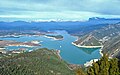 Embalse de Mediano, the tower of the Church of Mediano is visible