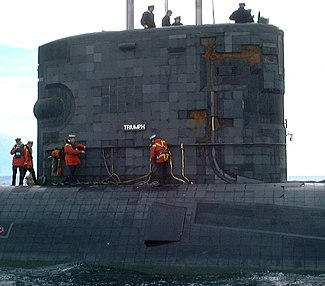 Anechoic tiles on the hull of HMS Triumph. Two patches of missing tiles are visible towards the forward edge of the sail. HMS Triumph 1 crop.jpg