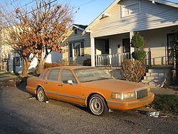 A Lincoln Town Car disabled by the flooding from Katrina. HollygroveFloodTaxi.jpg