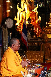 A Buddhist monk reciting prayers in Thailand Monkprayer.jpg