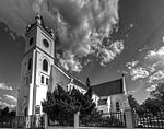 The cruciform church has Neo-Gothic features. It has a Tower in the middle of the front gable and at the corner-stone of this cruciform church with its Neo Gothic features was laid by the Moderator of the Orange Free State Synod, the Rev. I. J. T. Marquard, on 14 January 1899. The building was completed shortly after the outbreak of the Anglo-Boer War (1 Architectural style: Neo-Gothic. Type of site: Church Current use: Church. The corner-stone of this cruciform church with its Neo- Gothic features was laid by the Moderator of the Orange Free State Synod, the Rev. J. J. T. Marquard, on 14 January 1899. The building was completed shortly after the outbreak of the Anglo-Boer War (