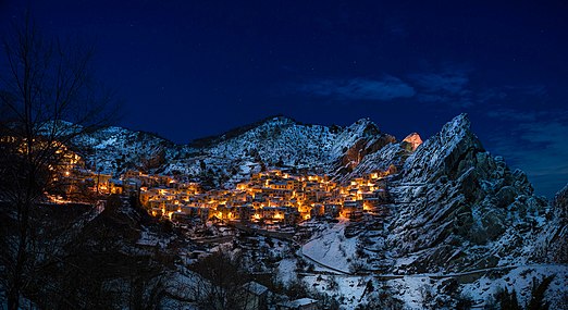Night view of Castelmezzano after a snowfall