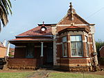 Nos 1 to 13 Artillery Street were built during the nineties of the nineteenth century by the Government of the old South African Republic as homes for officers and non-commissioned officers. These houses form a unique architecture.