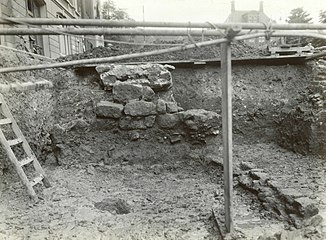Excavation in 1933. Stone wall is from a barracks